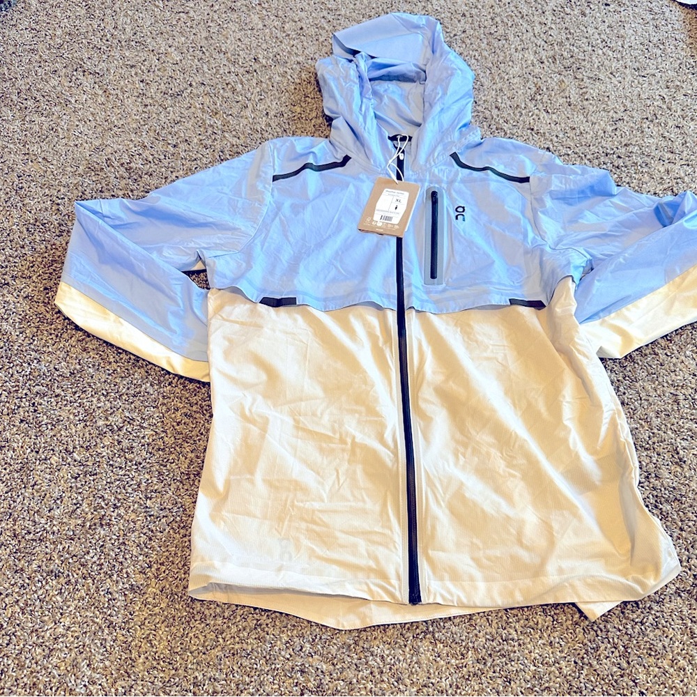 On Running Women’s weather jacket size is XL